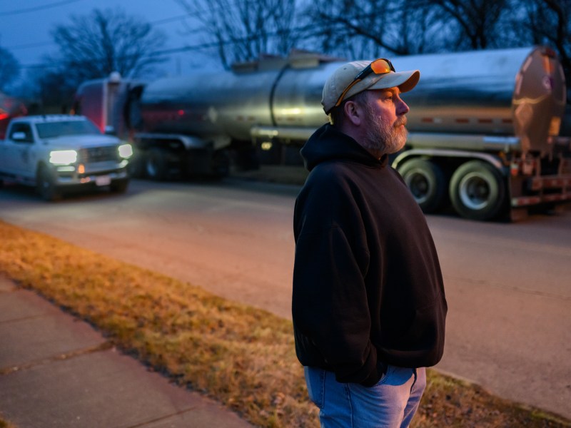 Ben Terwilliger stands outside his home in East Palestine, OH. Ben lives a block from the site of the Norfolk Southern train derailment and chemical spill. Photo by Rebecca Kiger for The Washington Post via Getty Images