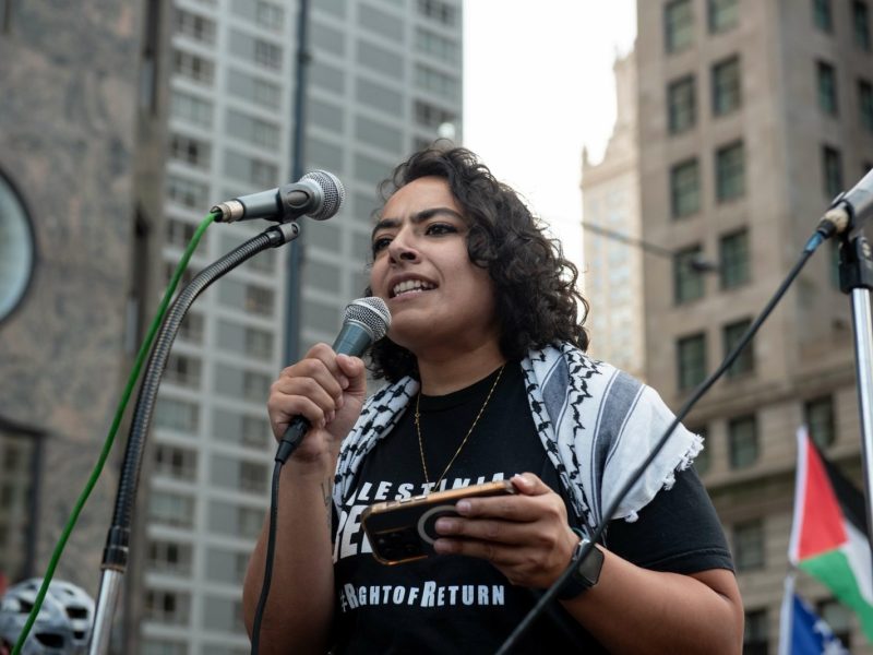 Eman Abdelhadi speaks at the Bodies Against Unjust Laws march in Chicago on Sunday, August 18. Photo by Steel Brooks