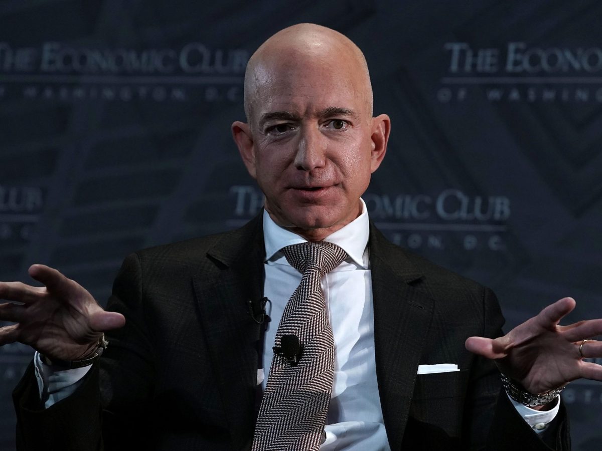 CEO and founder of Amazon Jeff Bezos participates in a discussion during a Milestone Celebration dinner September 13, 2018 in Washington, DC. Economic Club of Washington celebrated its 32nd anniversary at the event. Photo by Alex Wong/Getty Images