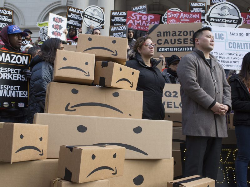 Activists, New York City politicians, and union members hold a press conference on the steps of City Hall to voice their opposition to a tax break deal given to Amazon, on December 12, 2018 in New York City. Photo by Andrew Lichtenstein/Corbis via Getty Images