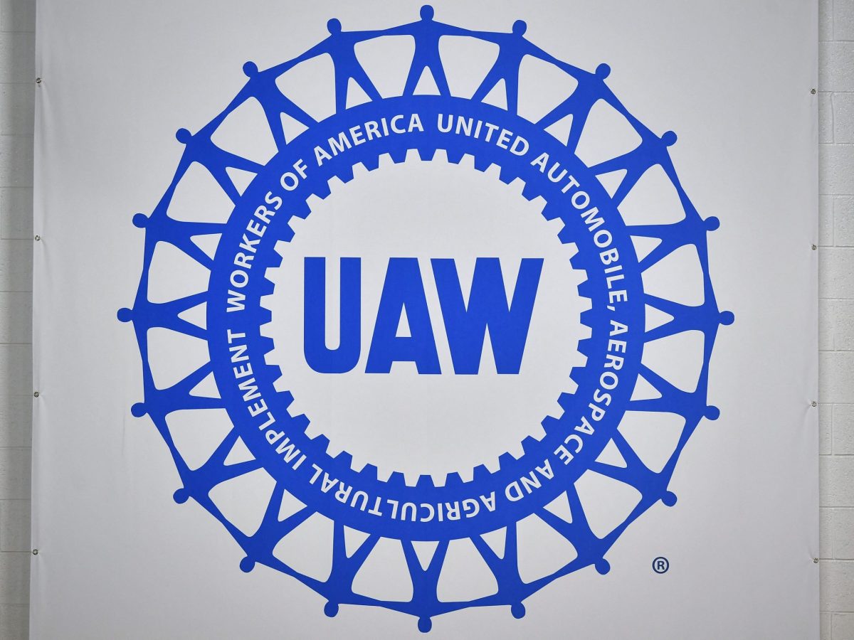 The logo of the United Auto Workers union is seen during a tour of the General Motors Factory ZERO electric vehicle assembly plant in Detroit, Michigan on November 17, 2021. Photo by MANDEL NGAN/AFP via Getty Images