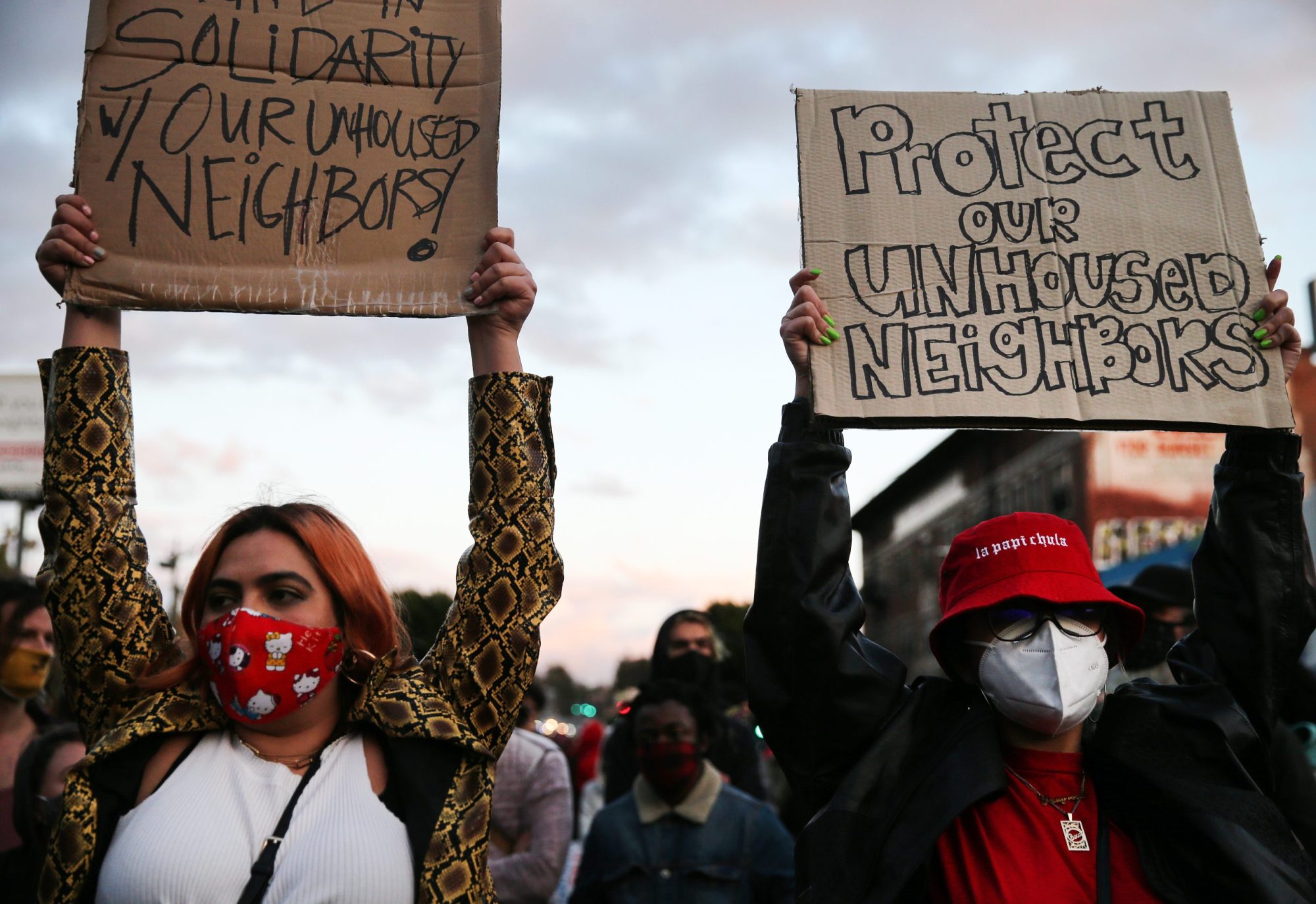 Protesters demonstrate on Sunset Boulevard against the removal of a homeless encampment at Echo Park Lake on March 25, 2021 in Los Angeles, California. Photo by Mario Tama/Getty Images