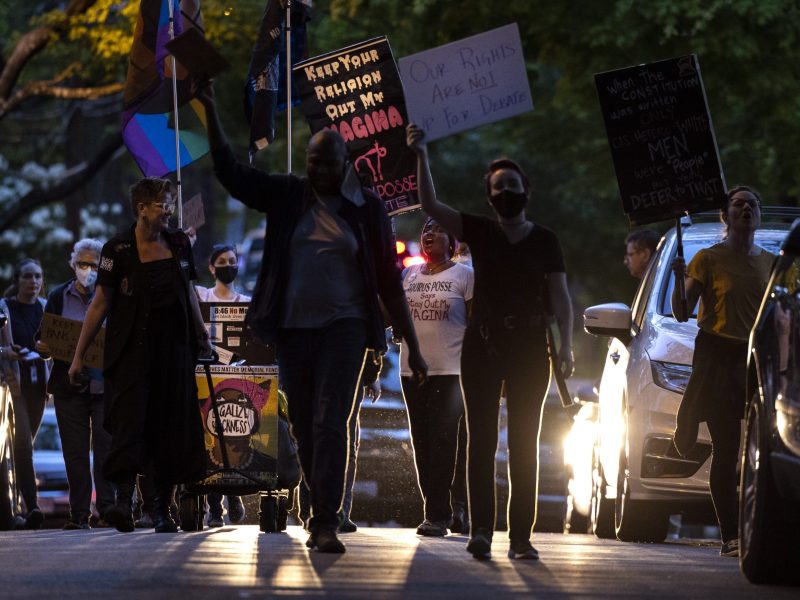 Abortion-rights advocates stage a protest outside the home of US Associate Supreme Court Justice Brett Kavanaugh on May 11, 2022, in Chevy Chase, Maryland.