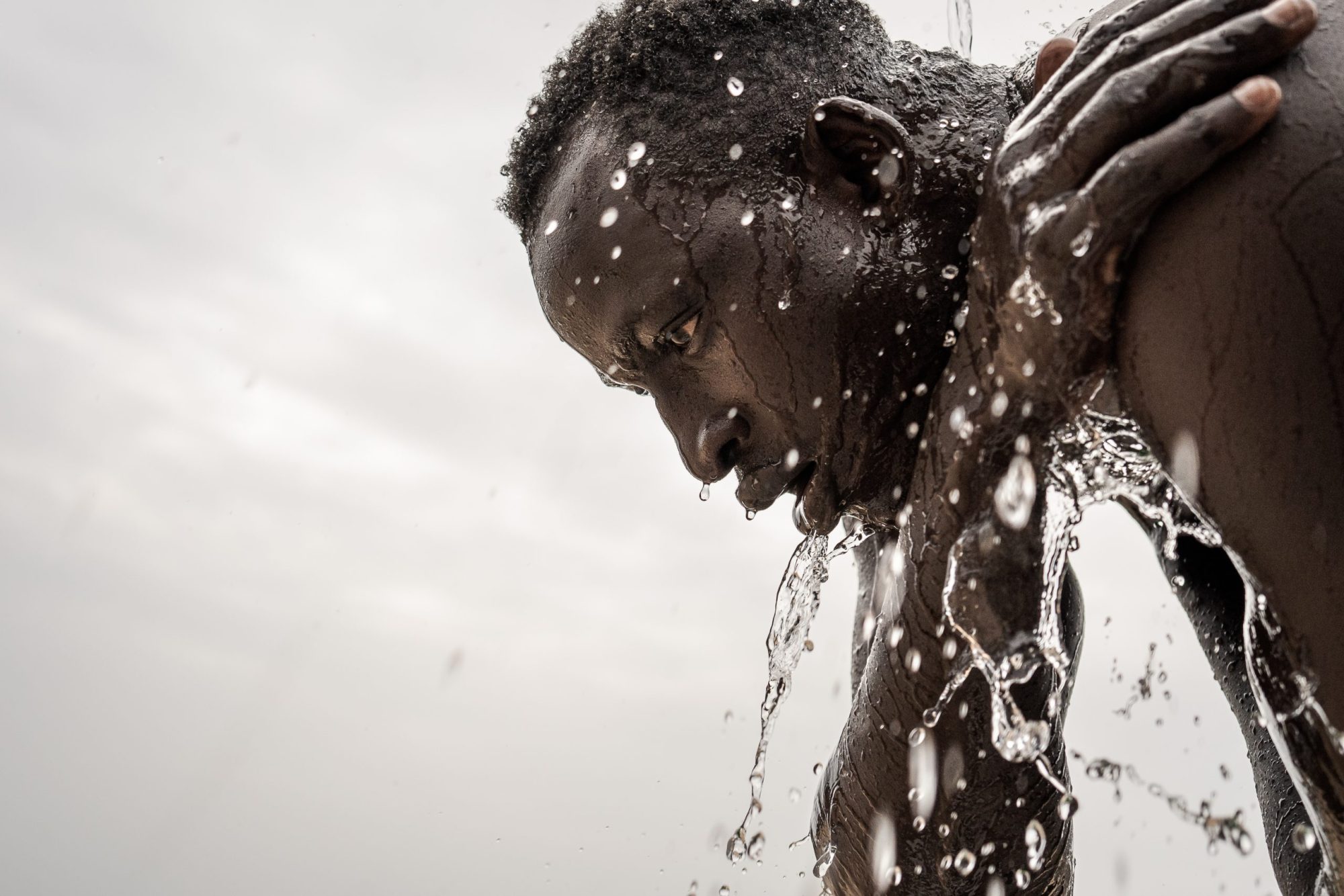 A Senegalese sand wrestler is seen during the training for their approaching competitions on the sandy beaches in Dakar, Senegal on August 28, 2023. Photo by Annika Hammerschlag/Anadolu Agency via Getty Images