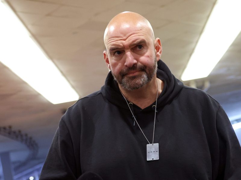 Sen. John Fetterman (D-PA) speaks to reporters before a Senate luncheon at the US Capitol on Dec. 12, 2023, in Washington, DC.