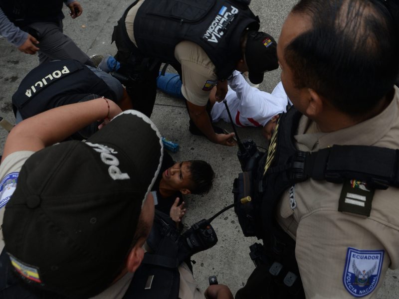 Ecuadorian police arrest several armed men who broke into the set of a public television channel after Ecuador president declares 'internal armed conflict,' orders military operations against organized crime groups in Guayaquil, Ecuador on January 09, 2024. Photo by Jose Orlando Sanchez Lindao/Anadolu via Getty Images