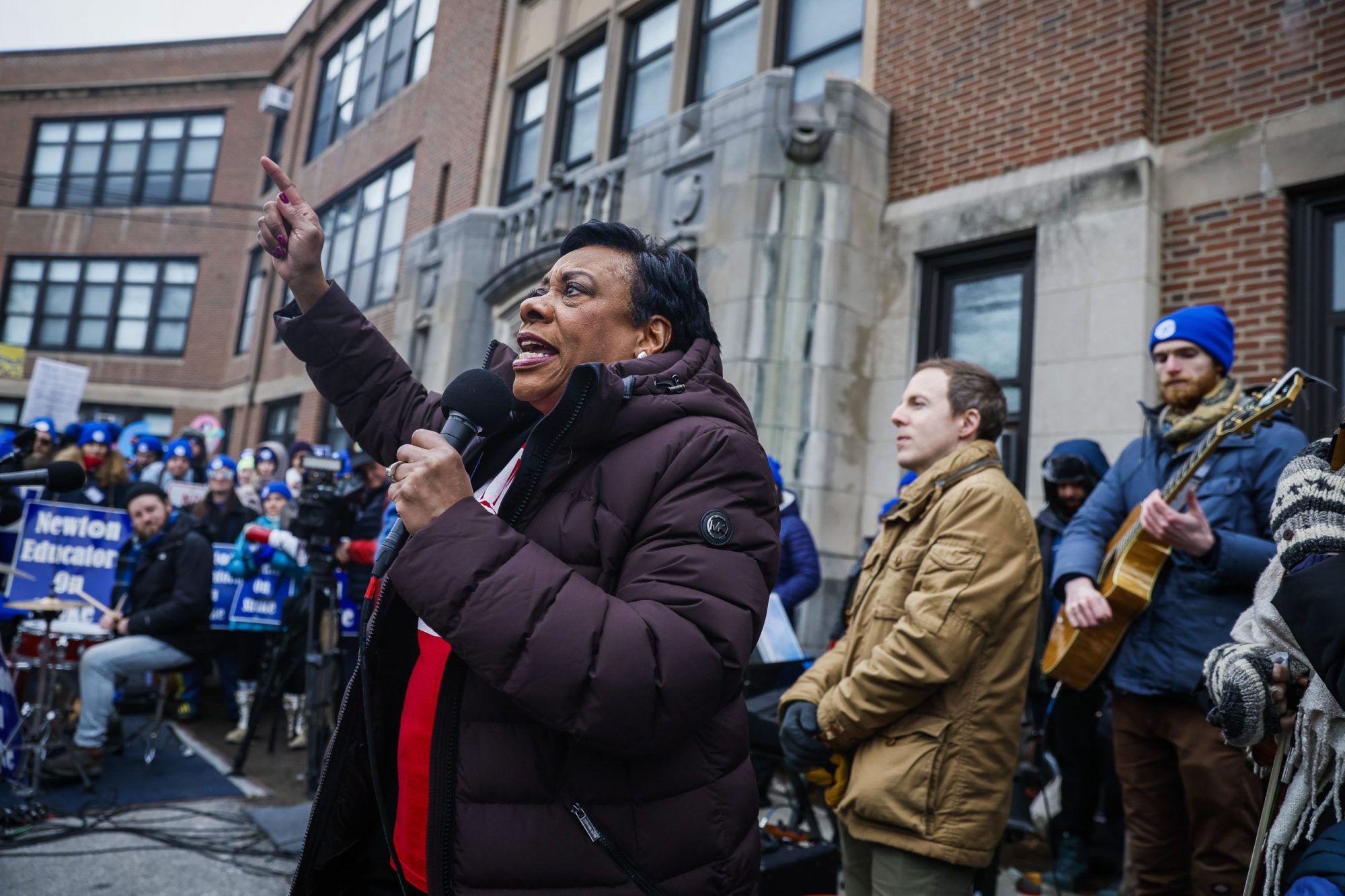 National Education Association President Becky Pringle speaks to Newton Public School educators as they rallied together on the lawn of Newton's Education Center, marking the ninth day of their strike. Photo by Erin Clark/The Boston Globe via Getty Images