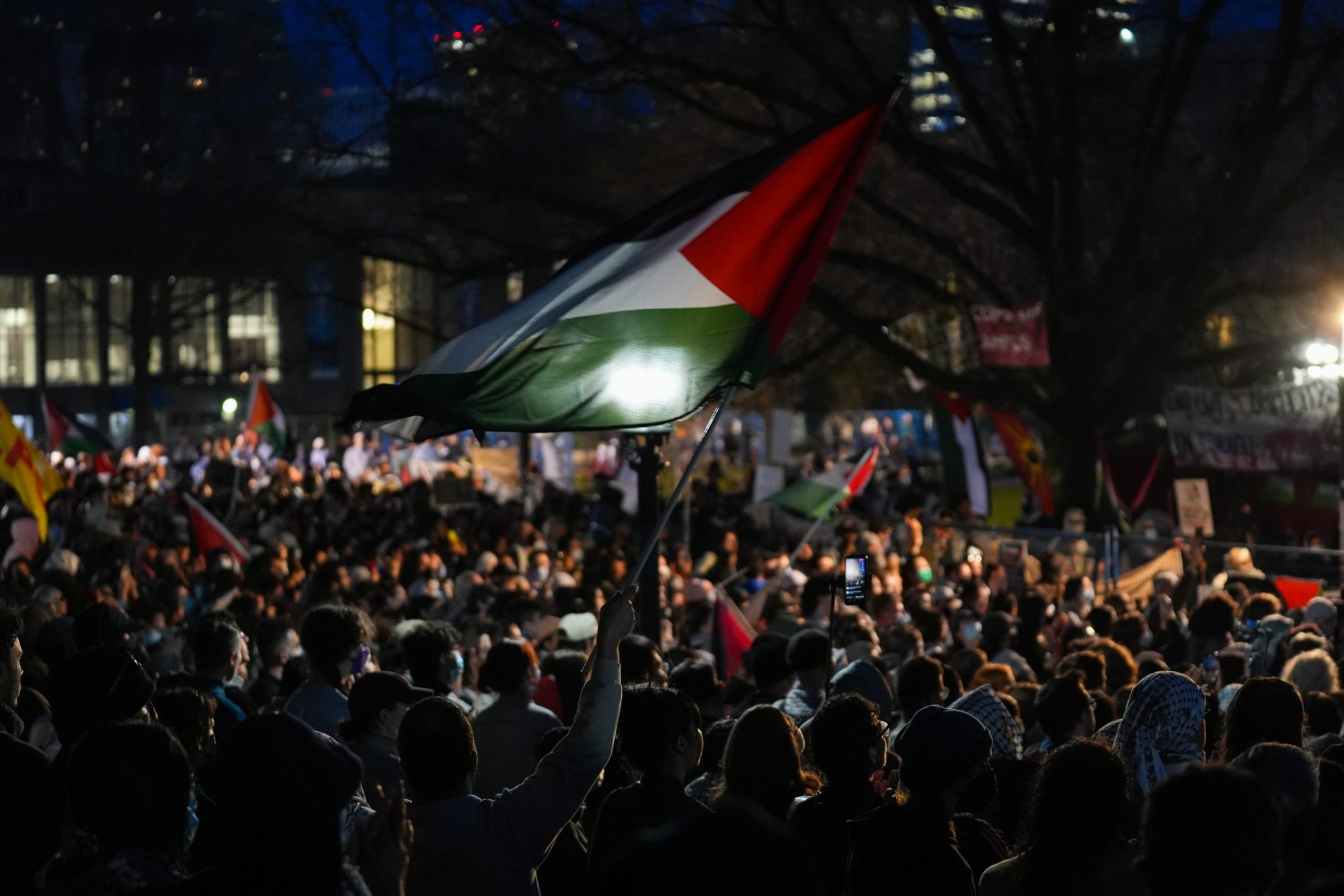 Pro-Palestinian supporters gather outside the encampment at University of Toronto as pro-Palestinian students and protestors gathered to protest Israeli attacks on Gaza, at King's College Circle in Toronto, Ontario on May 2, 2024. Photo by Mert Alper Dervis/Anadolu via Getty Images