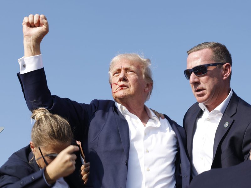 Republican presidential candidate former President Donald Trump is rushed offstage during a rally on July 13, 2024 in Butler, Pennsylvania. Photo by Anna Moneymaker/Getty Images