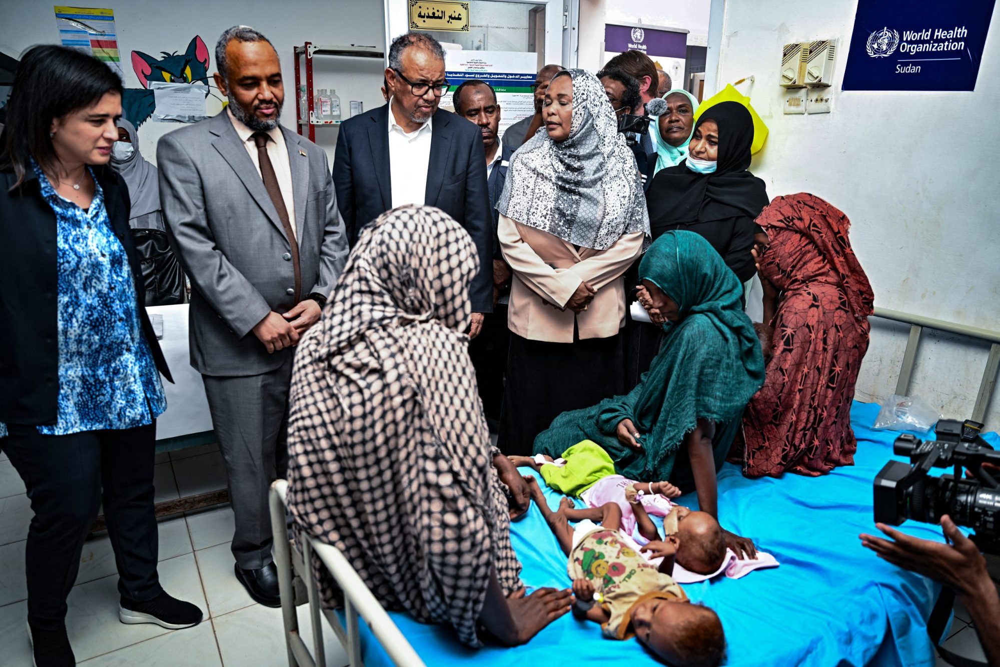 Director-General of the World Health Organization (WHO) Tedros Adhanom Ghebreyesus (C) , accompanied the organisation's Middle East Hanan Balkhy (L) visits a children's hospital in Port Sudan on September 7, 2024. Photo by -/AFP via Getty Images