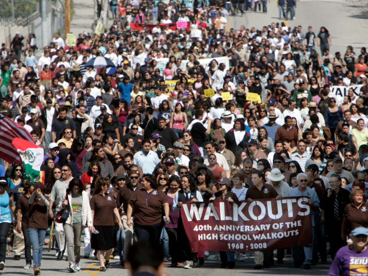 Over a thousand marchers turn up Eastlake Avenue on their way to Hazard Park. The march from Lincoln High School commemorates the 1968 East LA school walkout which launched the Chicano Civil Rights Movement. Photo by Annie Wells/Los Angeles Times via Getty Images