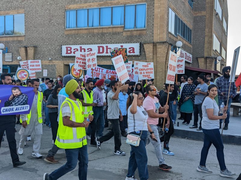 After demonstrating in front of Baba Dhaba, which stole thousands in wages from a handful of former workers in a matter of months, members and supporters of the Naujawan Support Network (NSN) headed down Rutherford Road South to Sukh Auto in Brampton, Canada, on July 9, 2022.