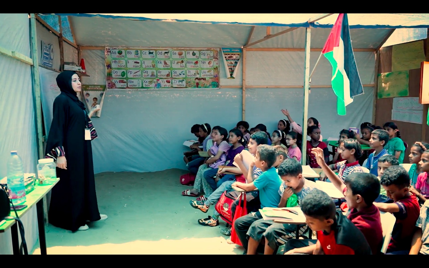 Iman Ismail, an Arabic teacher, addresses her classroom