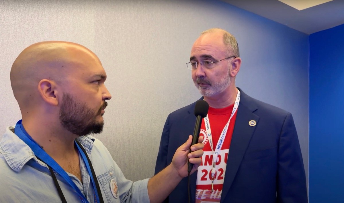 Still image of TRNN Editor-in-Chief Maximillian Alvarez (left) interviewing UAW president Shawn Fain (right) at the Democratic National Convention in Chicago on Aug. 21, 2024. Screenshot/TRNN.